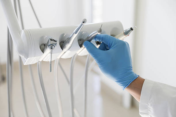 Professional Tooth Extraction technician working in West Monroe, MI